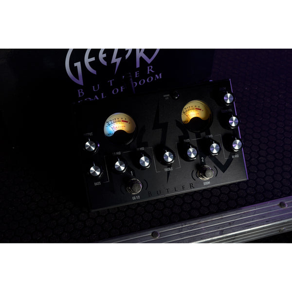 Geezer Butler pedal with control knobs on a dark background