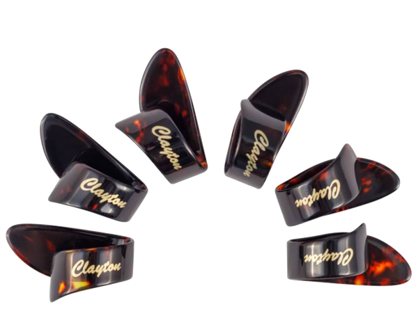 Set of tortoiseshell guitar picks with 'Clayton' branding on a white background