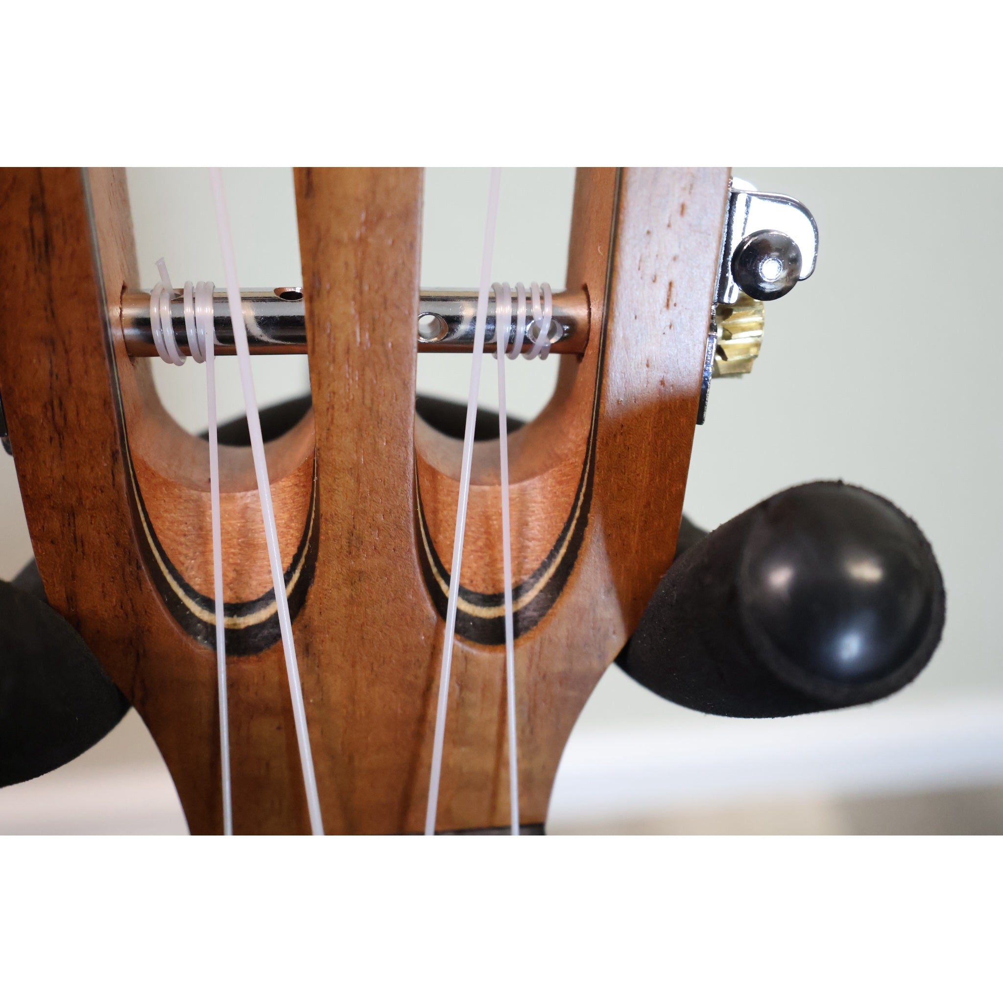 Kala KA-SA-T tenor ukulele slotted headstock close-up with strings and tuners