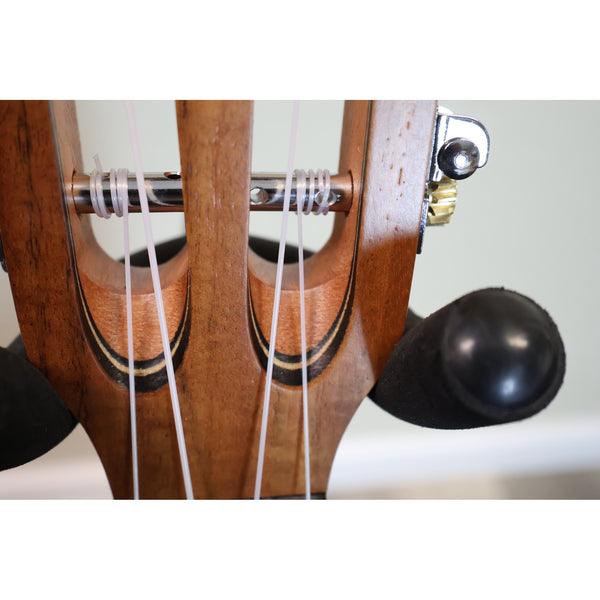 Kala KA-SA-T tenor ukulele slotted headstock close-up with strings and tuners