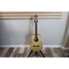 Protégé by Córdoba C1M 3/4 classical guitar in natural finish, full front view on a guitar stand