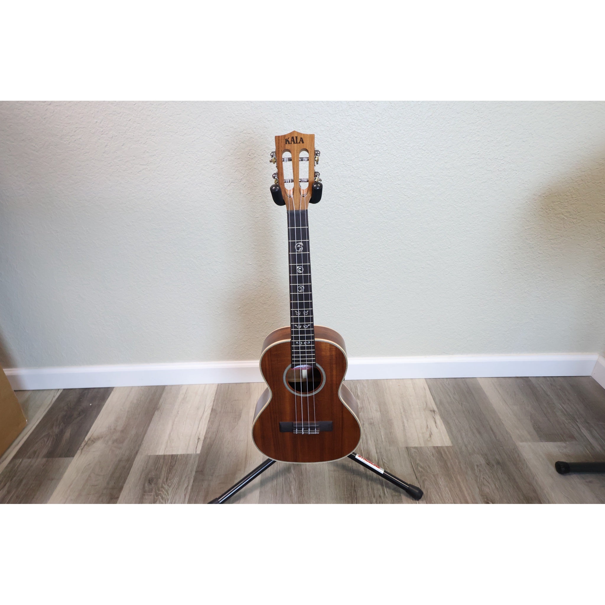 Kala KA-SA-T solid acacia tenor ukulele full front view on stand