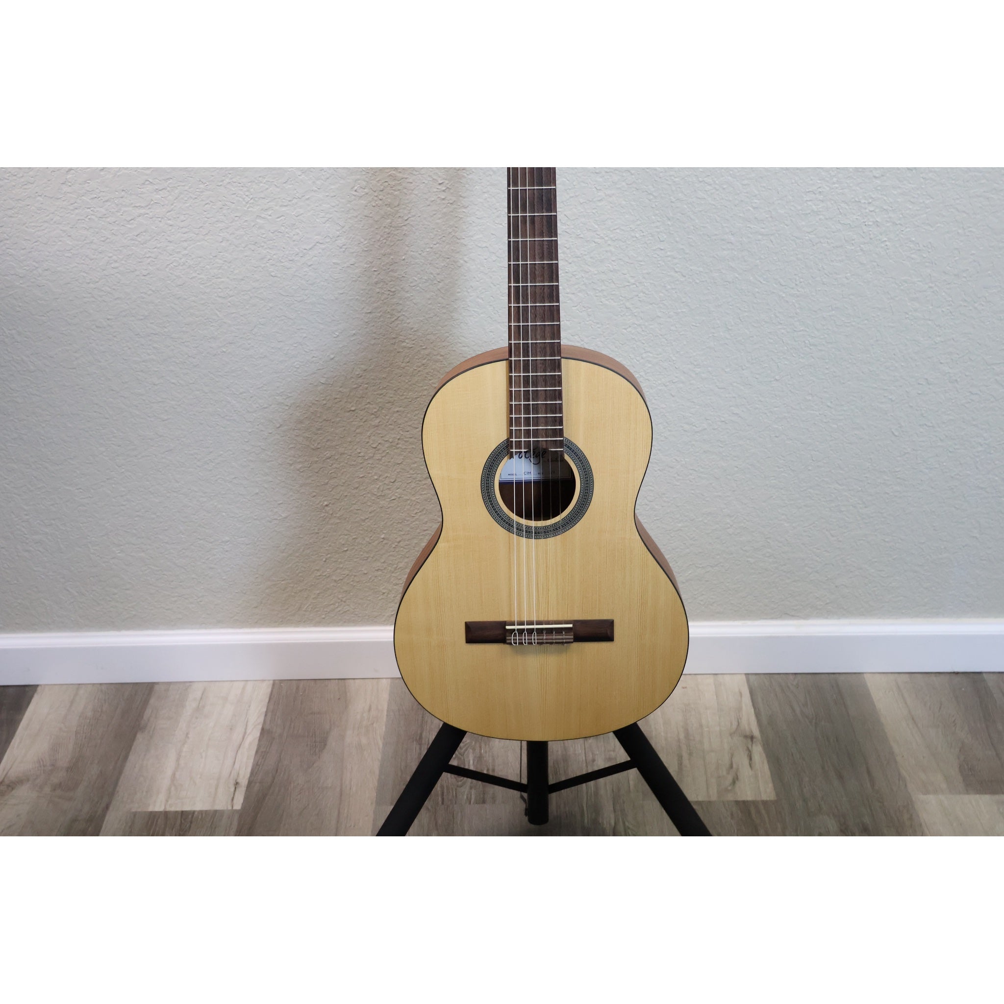 Protégé by Córdoba C1M 3/4 classical guitar, front view of spruce top, rosette and bridge