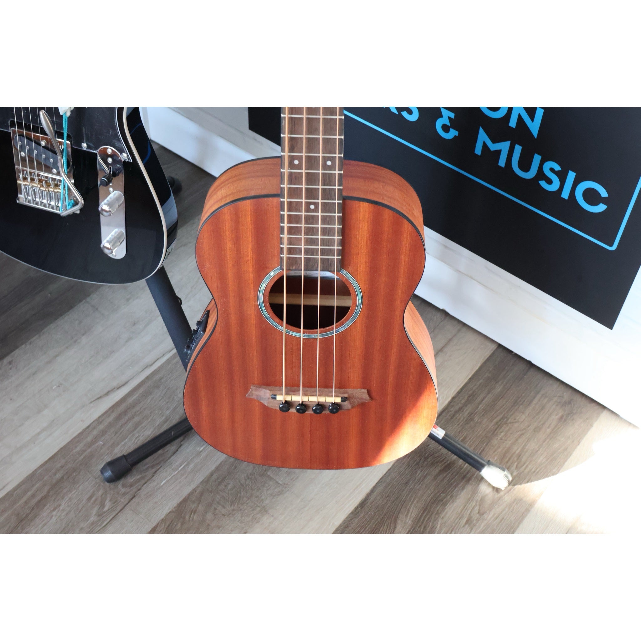 Córdoba Mini II Bass MH-E mahogany top, soundhole and bridge, close-up