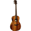 LAG T98PE Tramontane 98 Parlor Acoustic-Electric Guitar with a warm honey-toned finish, shown from a front-three-quarter angle against a solid white background.