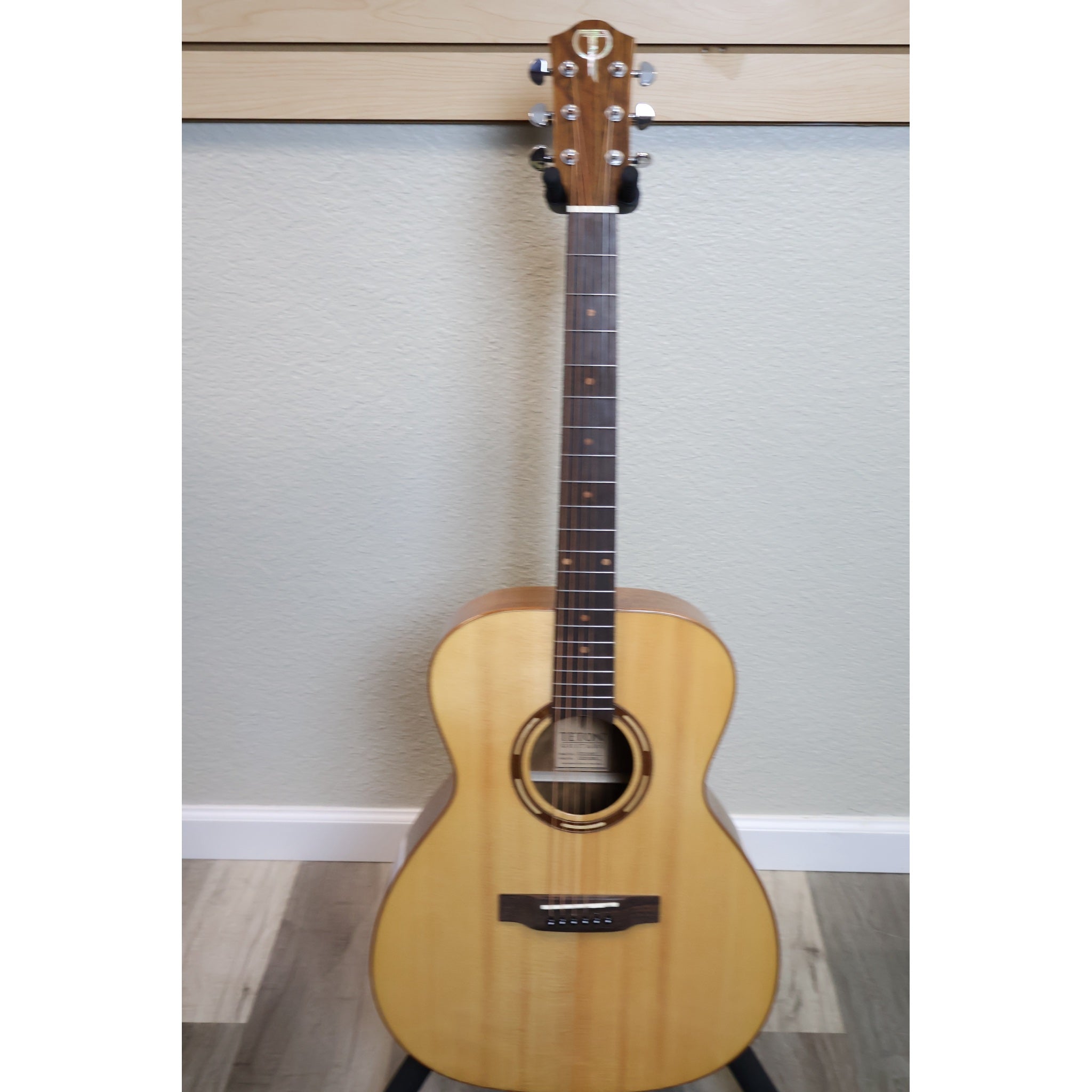 Teton STG110NT grand concert acoustic guitar front, solid Sitka spruce top in natural gloss