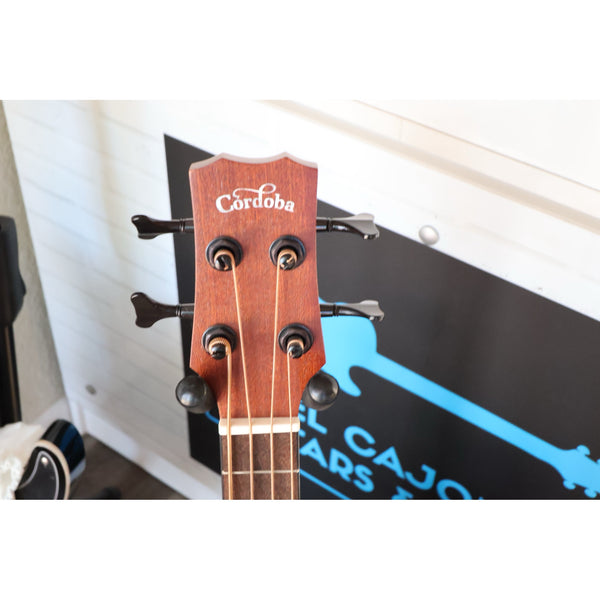 Córdoba Mini II Bass MH-E headstock with Córdoba logo and four tuners