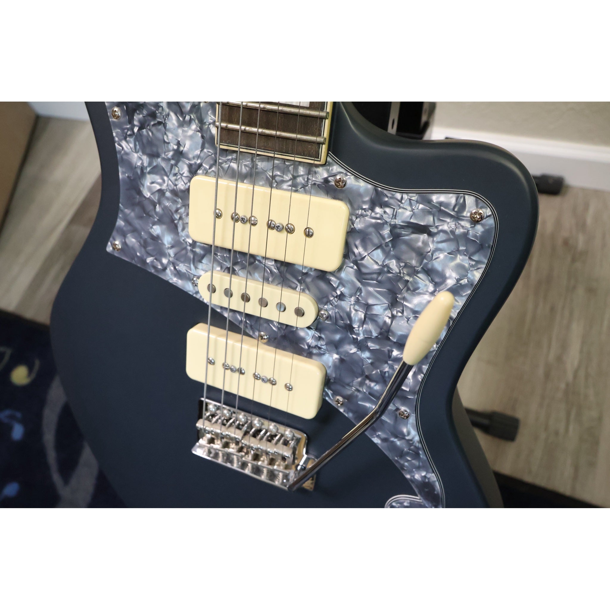 D'Angelico Premier Bob Weir Bedford cream pickups and black pearl pickguard close-up