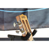 Side headstock Close-up of a A Kala KA-SA-TE-C All-Solid Acacia Tenor Cutaway Ukulele with Fishman Electronics ukulele  mounted in a black guitar stand, with tuning pegs and strings....showing the Kala logo and amazing tuners on this insrument.