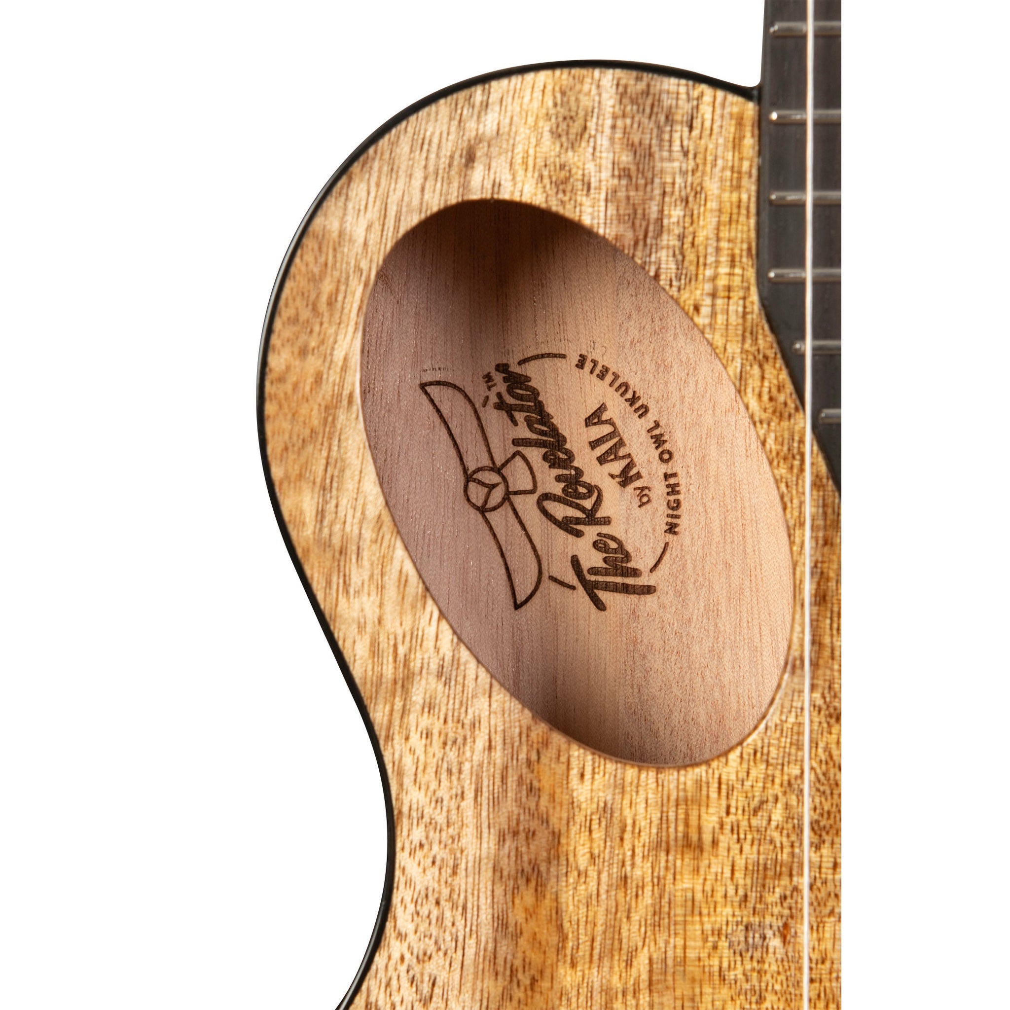 Close-up of a wooden ukulele with Kala Revelator Night Owl Mango Tenor Acoustic-Electric Ukulele a brand logo engraved on the soundhole.