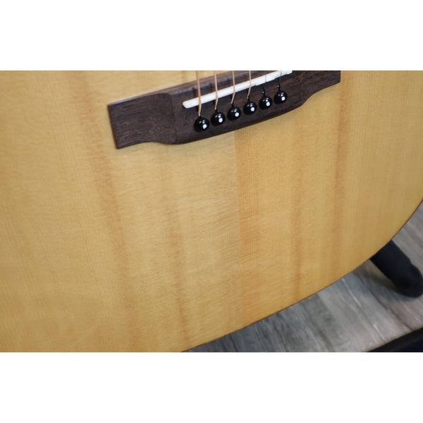 Teton STG110NT bridge and saddle close-up on solid Sitka spruce top