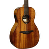 A close-up studio shot of LAG T98PE Tramontane 98 Parlor Acoustic-Electric Guitar showing a rich warm brown wood grain finish, black hardware, and a white brand label on the soundhole.