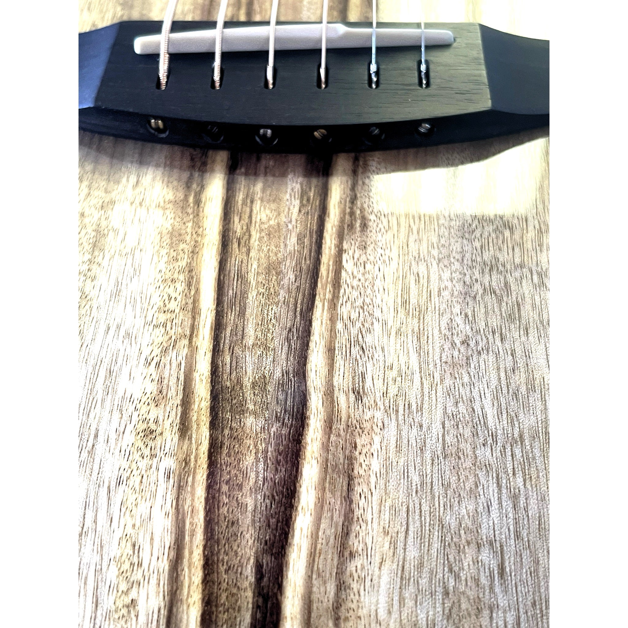 African ebony bridge and solid Myrtlewood top detail showing the distinctive natural grain – Breedlove Oregon Dreadnought Concerto CE, serial 30844