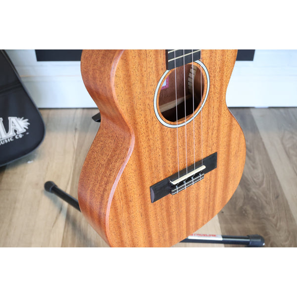 Side view of a Kala KA-WF-AMHG-T All Solid Mahogany Waterfall Tenor Ukulele at ECGMusic.