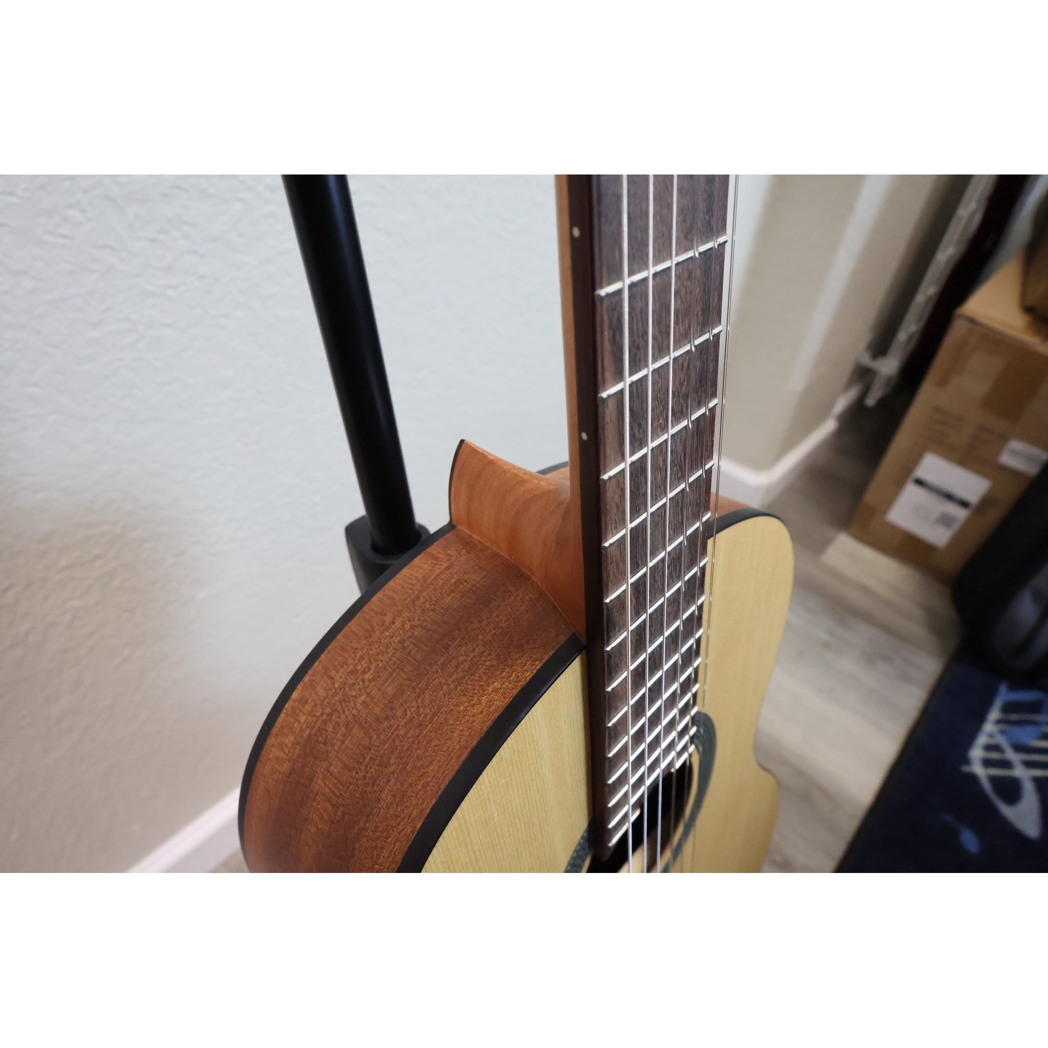 Protégé by Córdoba C1M 3/4 classical guitar, angled view of neck, fretboard and mahogany side