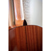 Córdoba C5 CD Close-up of a wooden acoustic guitar with a blurred background