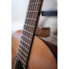 Córdoba C5 CD Close-up of a guitar's neck and body with a blurred background