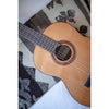 Córdoba C5 CD Acoustic guitar on a patterned surface