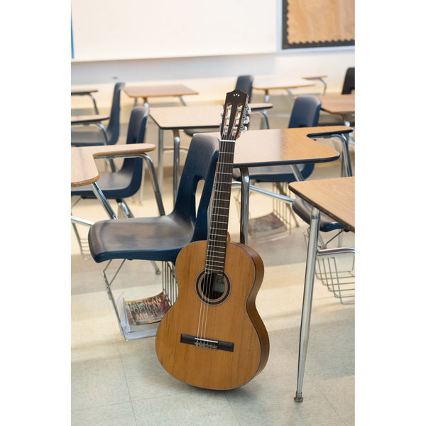Córdoba C3M Classroom setting with a guitar on the floor