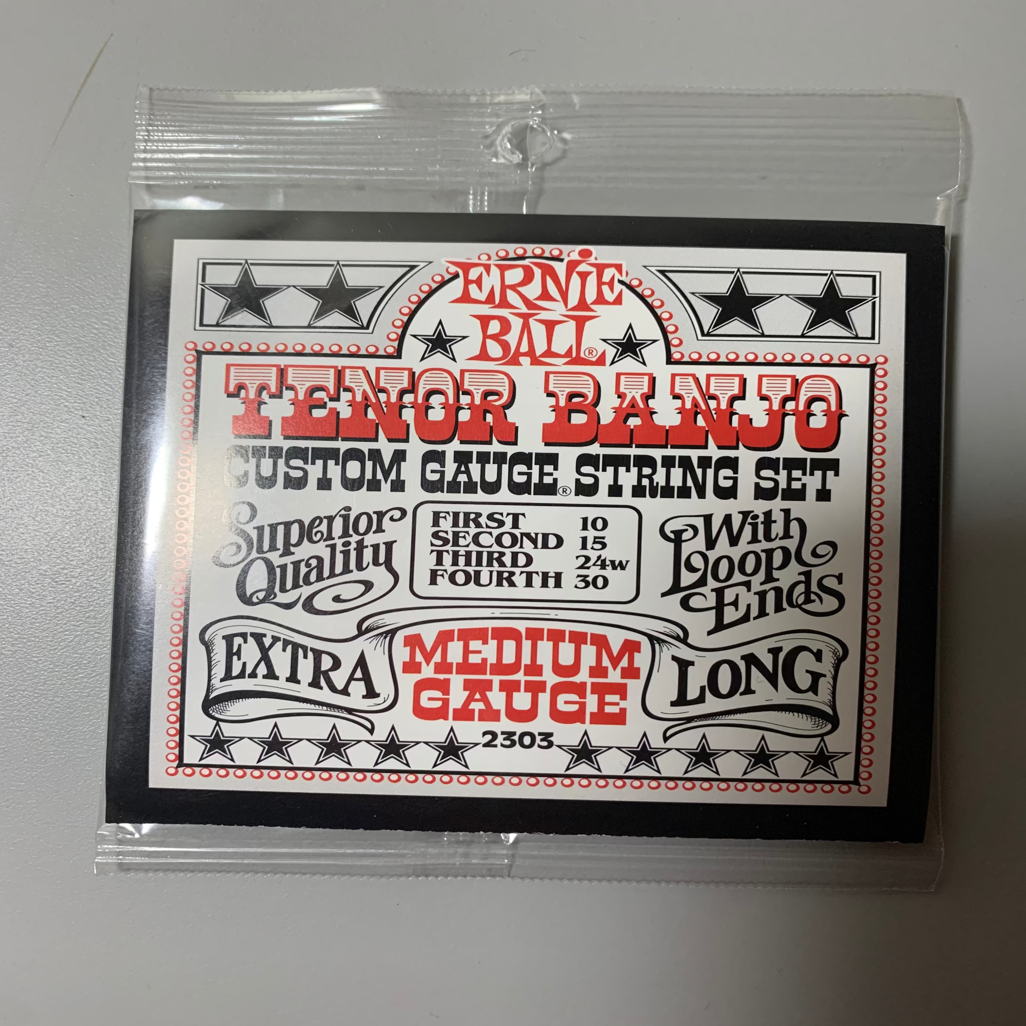 Ernie Ball 2303 Tenor Banjo Strings medium gauge package
