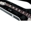 Electric guitar in a black case on a white background