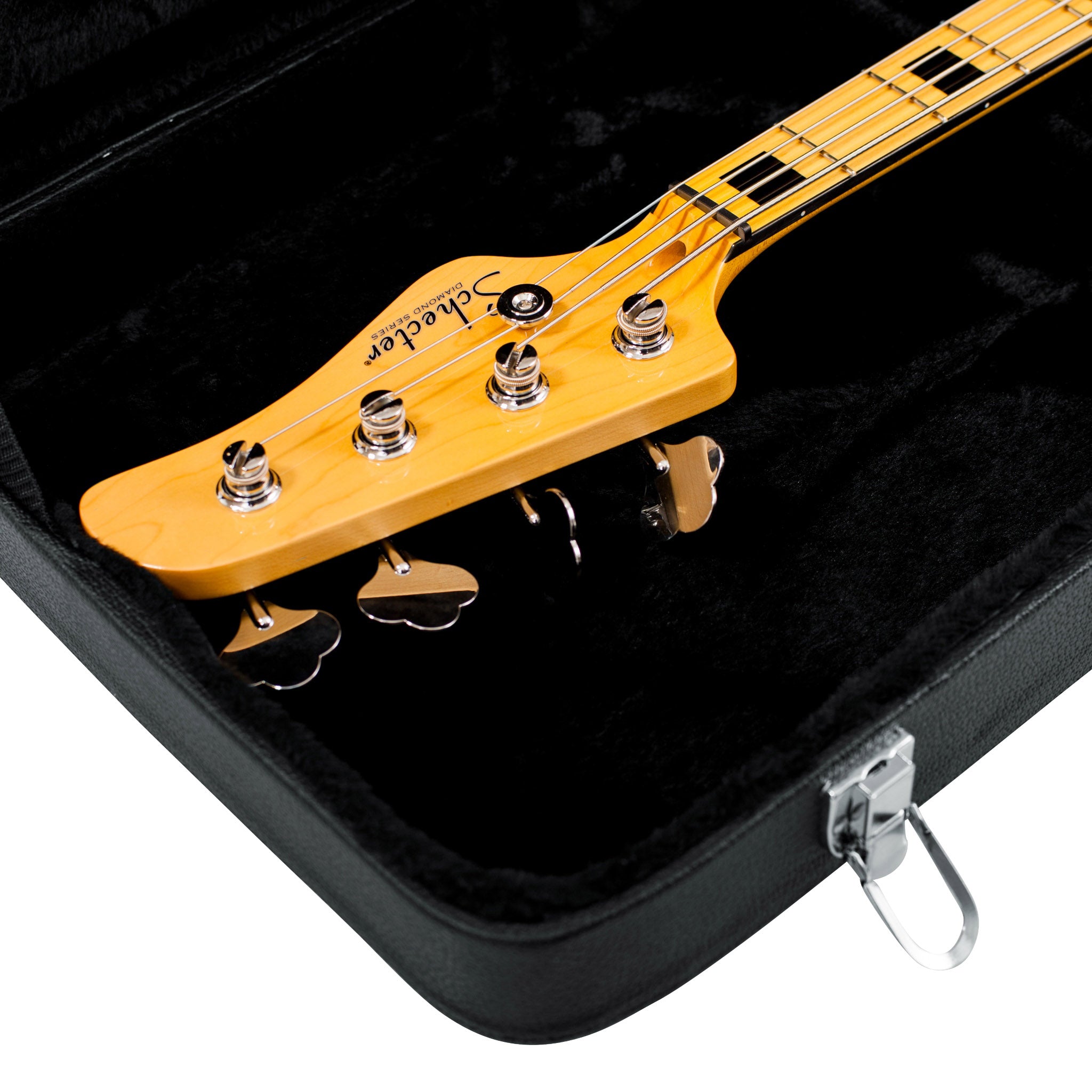 GWE-BASS Close-up of a guitar headstock with 'Fender' branding inside a black case.