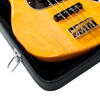 GWE-BASS Close-up of a yellow electric bass guitar in a black case on a white background