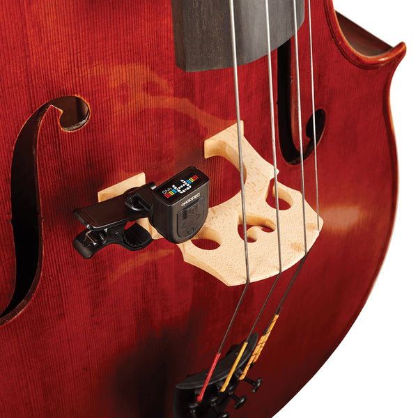 Red violin with a D'Addario PW-CT-13 Micro Universal Guitar Tuner digital tuner attached to the bridge