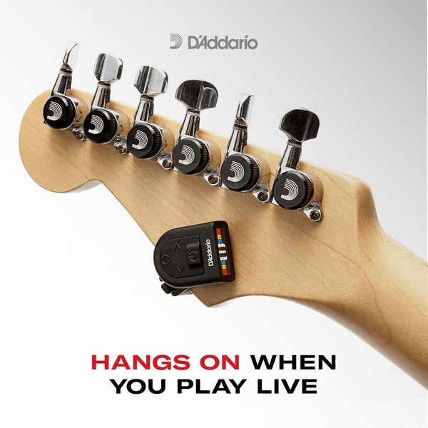 Guitar headstock with D'Addario tuner and promotional text on a white background D'Addario PW-CT-13 Micro Universal Guitar Tuner.