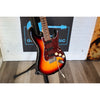 Electric guitar on a stand with a blurred background