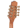 Close-up of a guitar headstock with wooden finish and gold tuning pegs on a white background