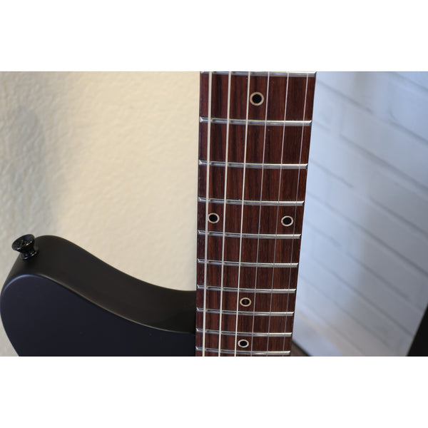 Tune-O-Matic bridge and stop tailpiece on the Tagima Rocker Cosmos Stealth guitar