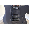 Black locking tuner detail on the Tagima Rocker Cosmos Stealth guitar headstock