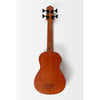 The back view of a Kala Nomad Acoustic-Electric U•BASS® - UBASS-NOMAD-FS against a light gray background, showing the reddish-brown wood finish and a metal US Bass logo plate on the lower back.