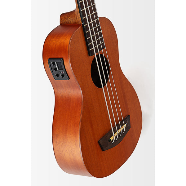 A close-up of a Kala Nomad Acoustic-Electric U•BASS® - UBASS-NOMAD-FS with four strings, a sound hole, and a black pickup component on the side, photographed against a plain light background.