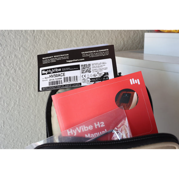 Lâg HyVibe 50 Auditorium Bevel Cutaway Smart Guitar – HV50ACE-2512LT22580 -with Warranty Registration & Serial Number card, HyVibe 2 Manual, Truss Tool, and USB charging cable in upper case pocket 3700166376939
2512LT22580.