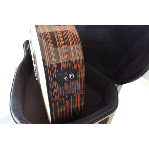 Lâg HyVibe 50 Auditorium Bevel Cutaway Smart Guitar – HV50ACE-2512LT22580 - bottom end pin and input/ output/ charging port showing detail in case