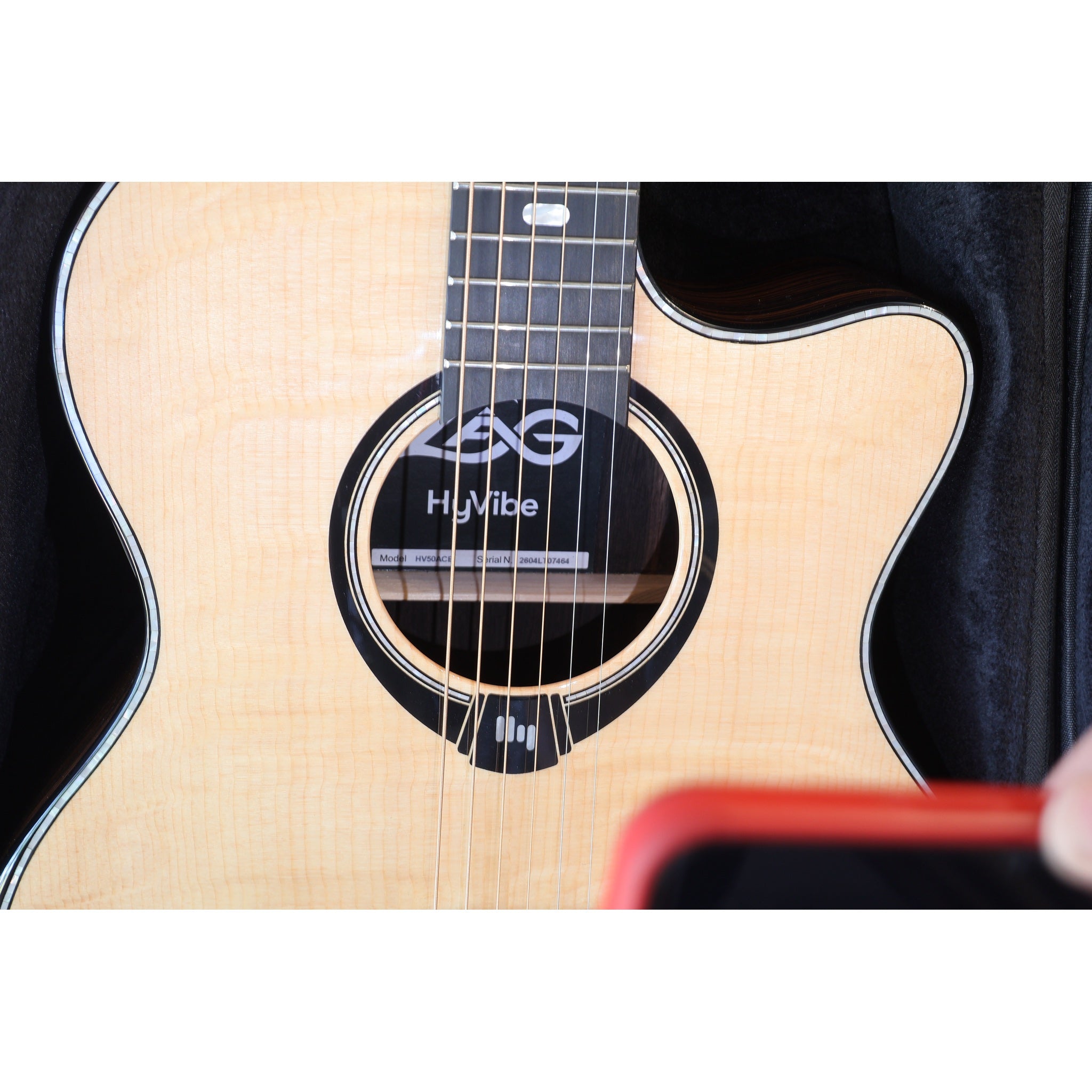 Lâg HyVibe 50 Auditorium Bevel Cutaway Smart Guitar – HV50ACE-2604LT07464 sound hole and internal sticker showing.