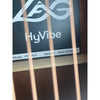View from the string side of the sound hole showing the sticker with the serial number on this Lâg HyVibe 10 HV10ACE, Serial Number 2604LT07360.