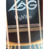 Close up from the string side of the sound hole showing the interior sticker of  this Lâg HyVibe 10 HV10ACE with Serial Number 2604LT07360.
