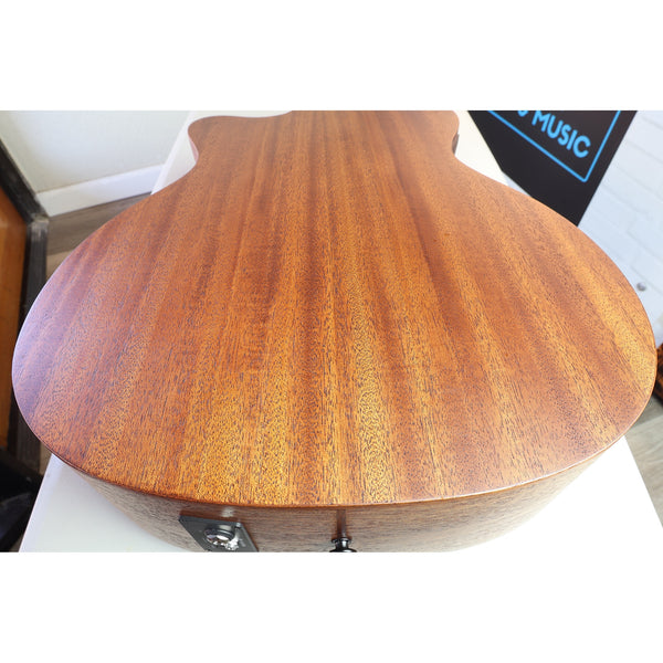 Back of the acoustic guitar from the end pin view, at slight downward angle, showing the wood grain on this Lâg HyVibe 10 HV10ACE Serial 2604LT07360.