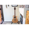 This Lâg HyVibe 10 HV10ACE, Serial Number 2604LT07360, in a stand at the front of El Cajon Gutiars & Music, ECGMusic.com