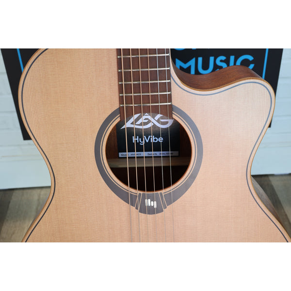 Rosette/ sound hole view with lower fretboard and middle bought view of this Lâg HyVibe 10 HV10ACE Serial 2604LT07360.