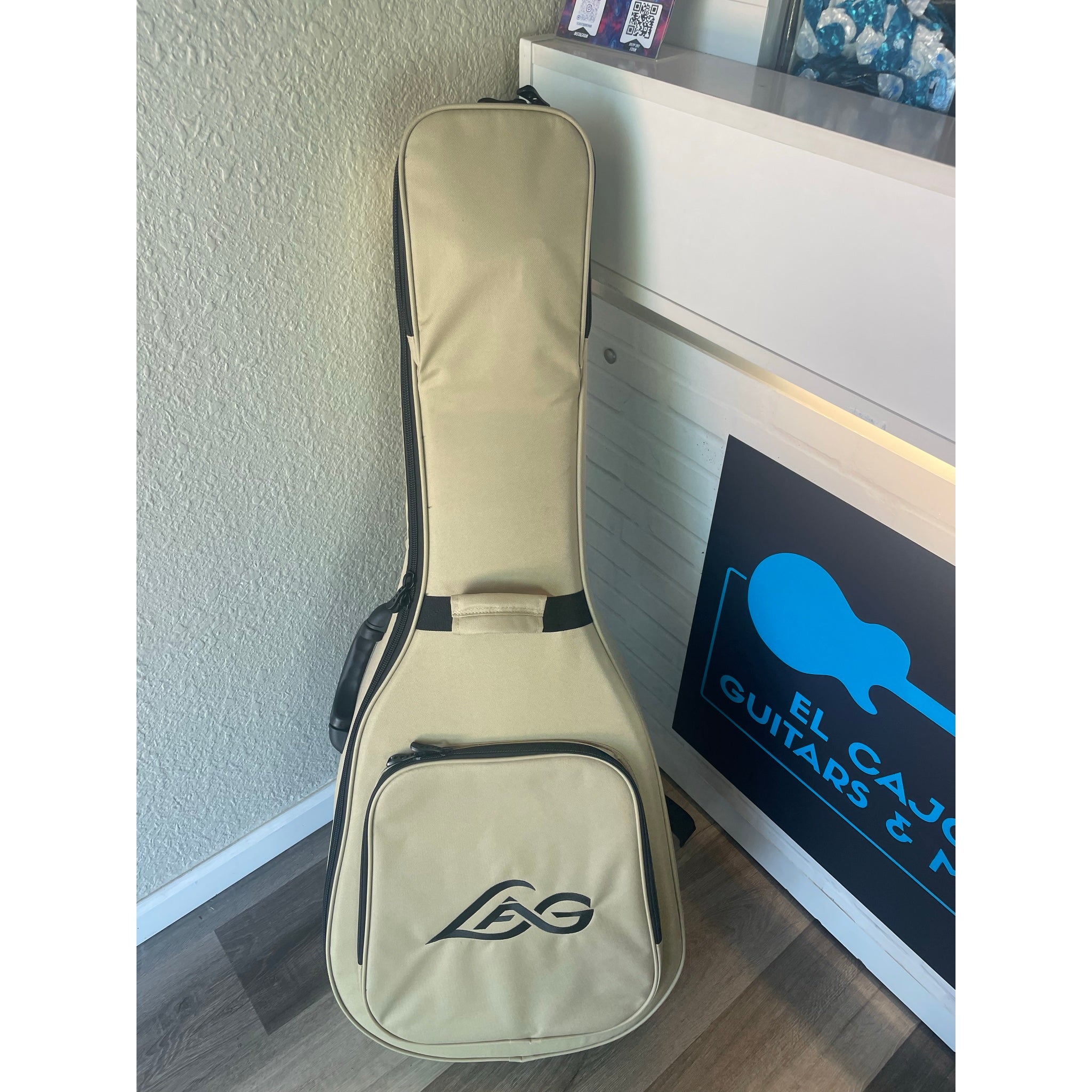 Front of case for this Lâg HyVibe 10 HV10ACE guitar with Serial Number 2604LT07360.