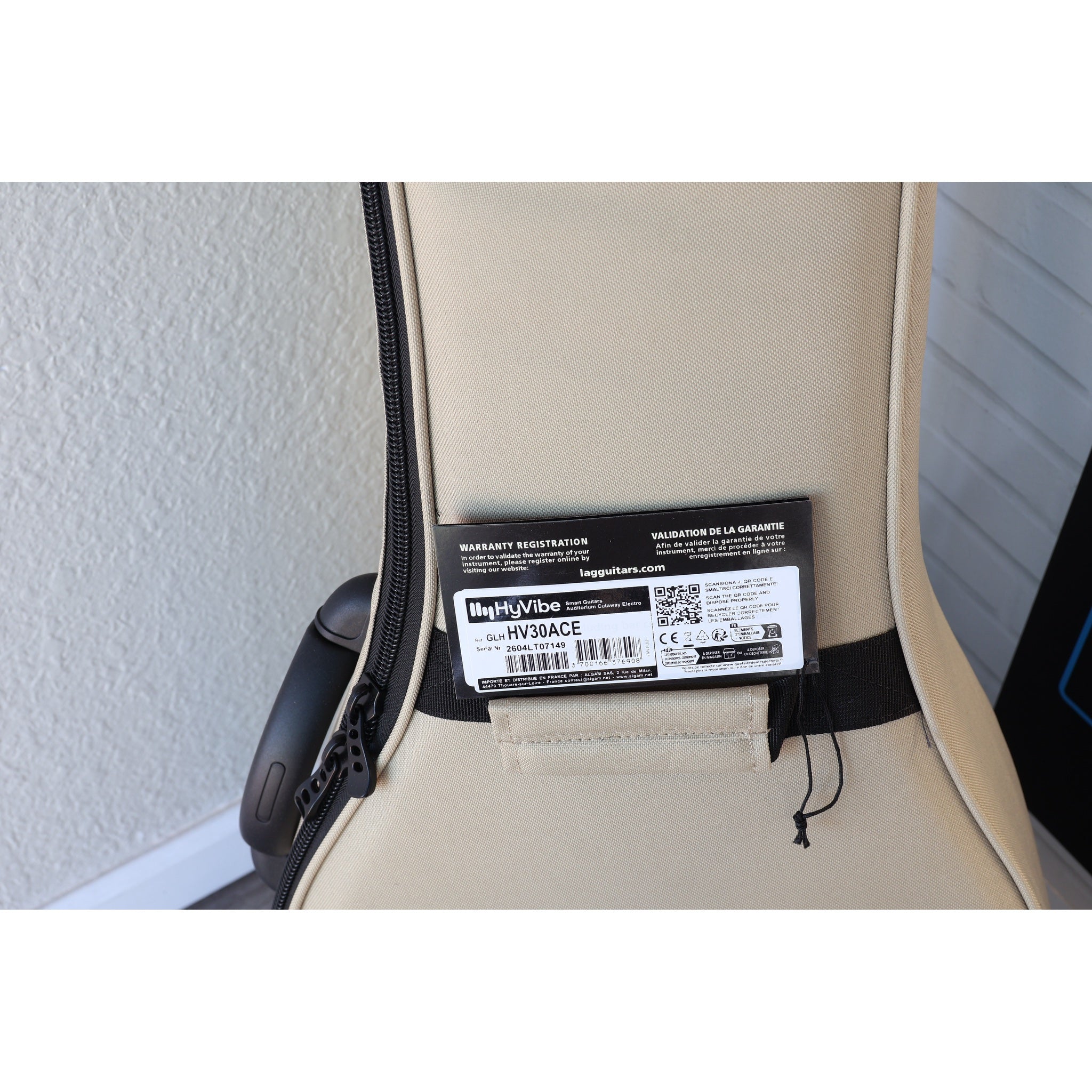 Lâg HyVibe 30 HV30ACE Smart Auditorium Acoustic-Electric Guitar Tags showing UPC: 3700166376908 with Serial number: 2604LT07149