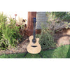 Lag Smart Guitar Hyvibe 30 Auditorium Cutaway Gloss at ECG Music - front full acoustic guitar in stand at ECGMusic outside