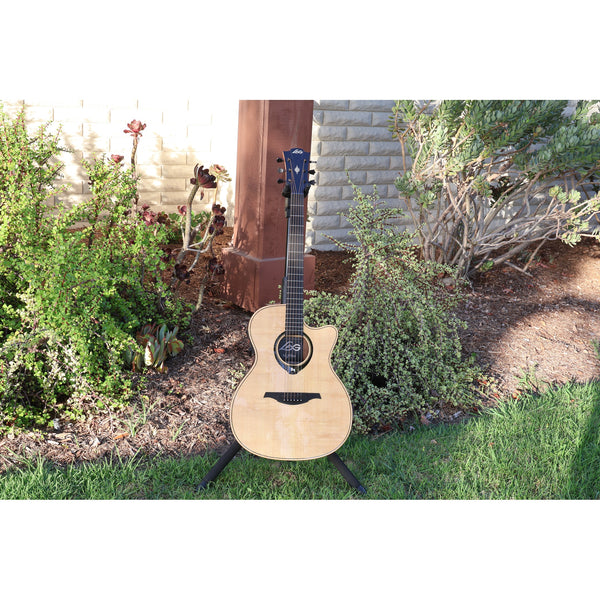 Lag Smart Guitar Hyvibe 30 Auditorium Cutaway Gloss at ECG Music - front full acoustic guitar in stand at ECGMusic outside