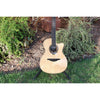 Lag Smart Guitar Hyvibe 30 Auditorium Cutaway Gloss at ECG Music - acoustic guitar in stand at ECGMusic - body closeup