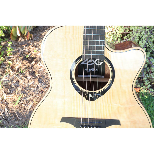 Lag Smart Guitar Hyvibe 30 Auditorium Cutaway Gloss at ECG Music - natural lighting . great grain front!