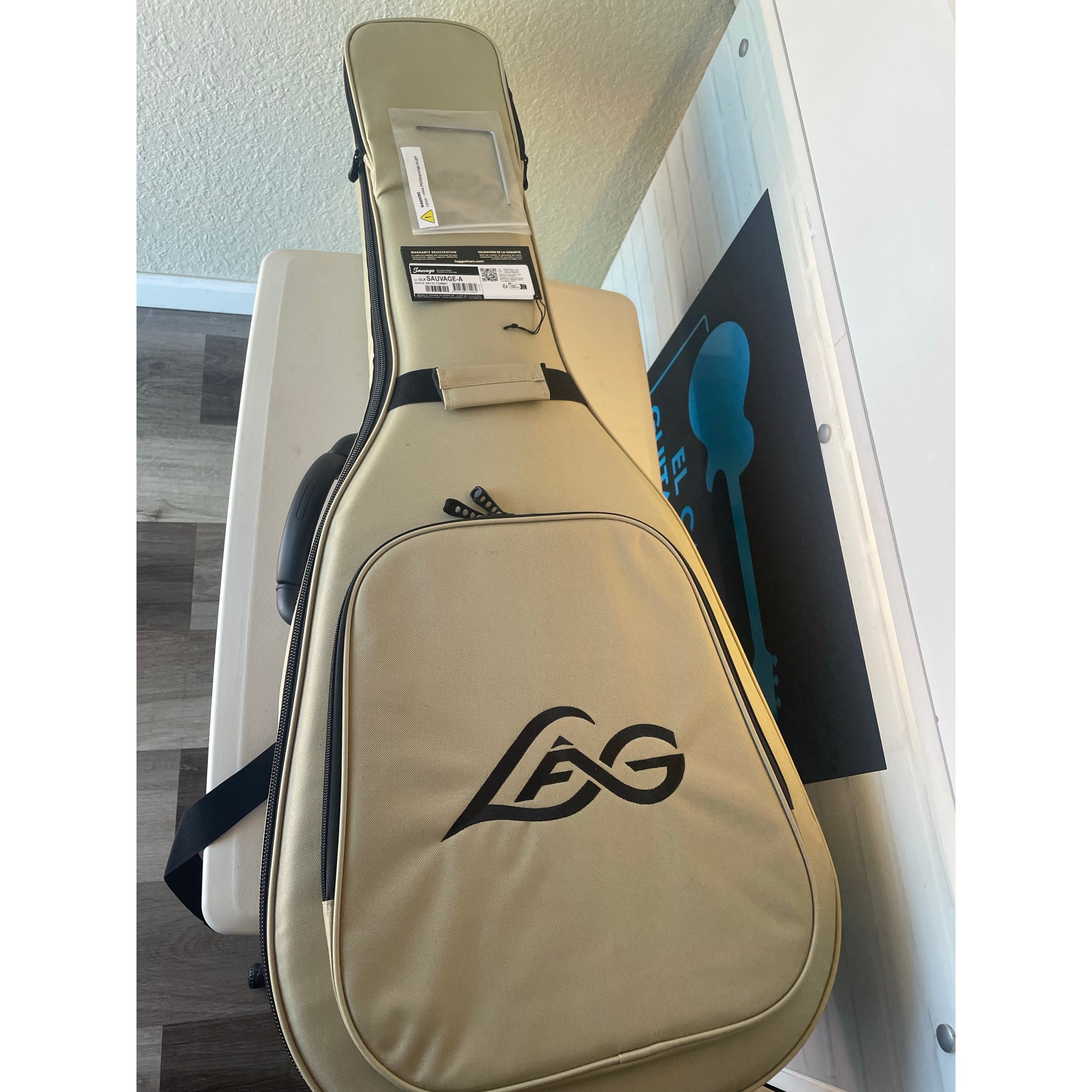 The case that comes this guitar the  Lâg Sauvage-A Auditorium Acoustic Guitar with Serial 2511LT20951 